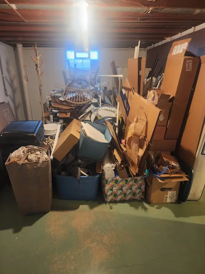 Roll-off dumpster container at job site for Concrete Dumpster Rental in Elmira Heights